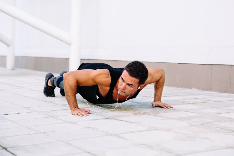 Man doing slow negative push-up exercise