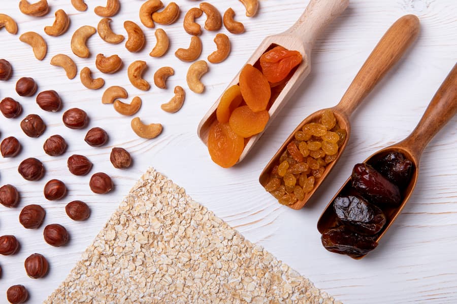 oats, nuts, dried fruit and dates for healthy snack bars