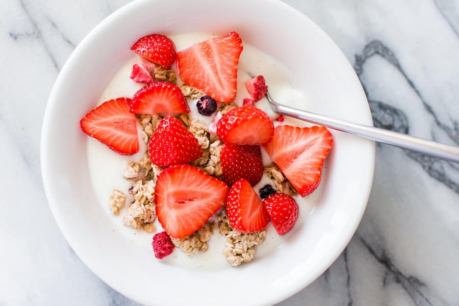 Greek yogurt with strawberries, a simple one of the healthy snacks for pregnant ladies