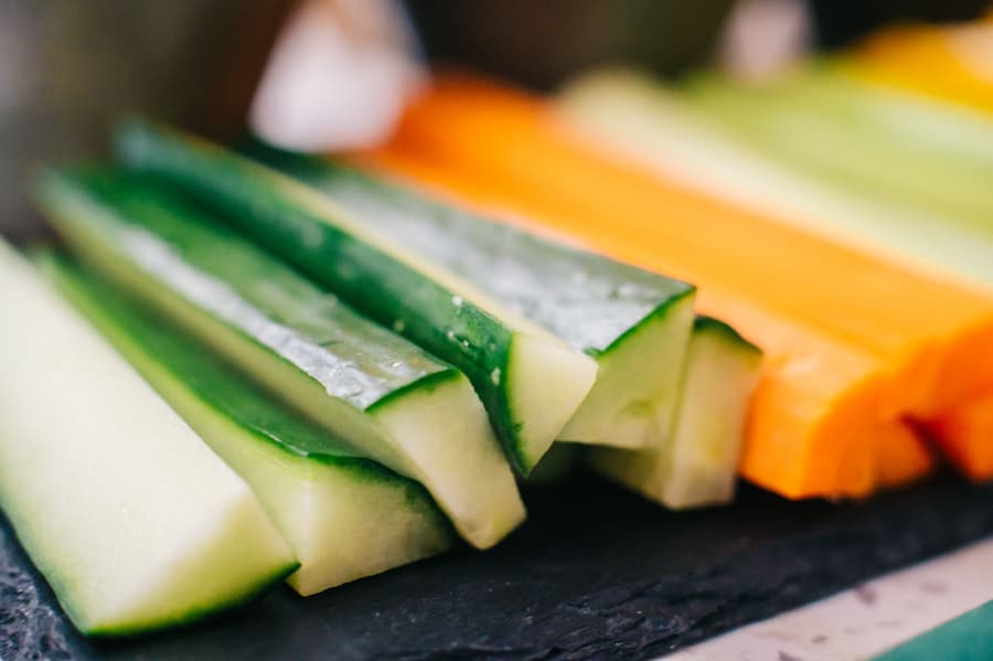 Fresh carrot and cucumber sticks, a crunchy healthy school snack