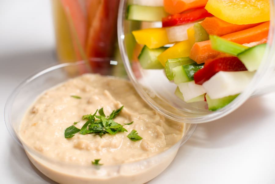 Hummus with fresh colorful vegetable sticks